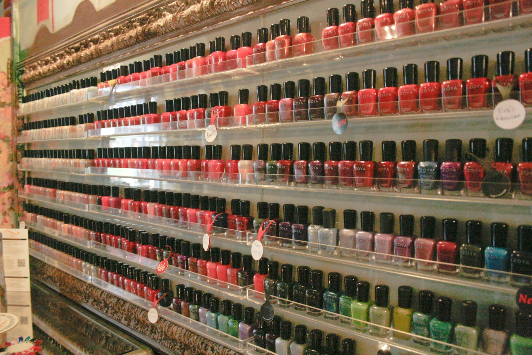 A curated wall of Zoya, Qtica, Spa Ritual and Gehwol nail colors