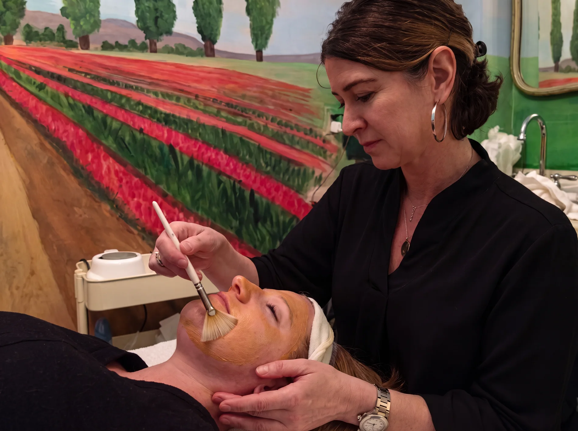 Eva, our Hungarian Master Esthetician, at work in our Aspinwall studio